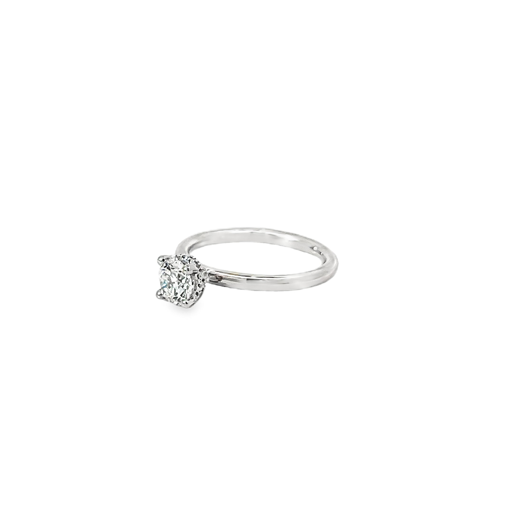 0.56ct Lab Grown Round Brilliant Cut Diamond Engagement Ring Set In Platinum