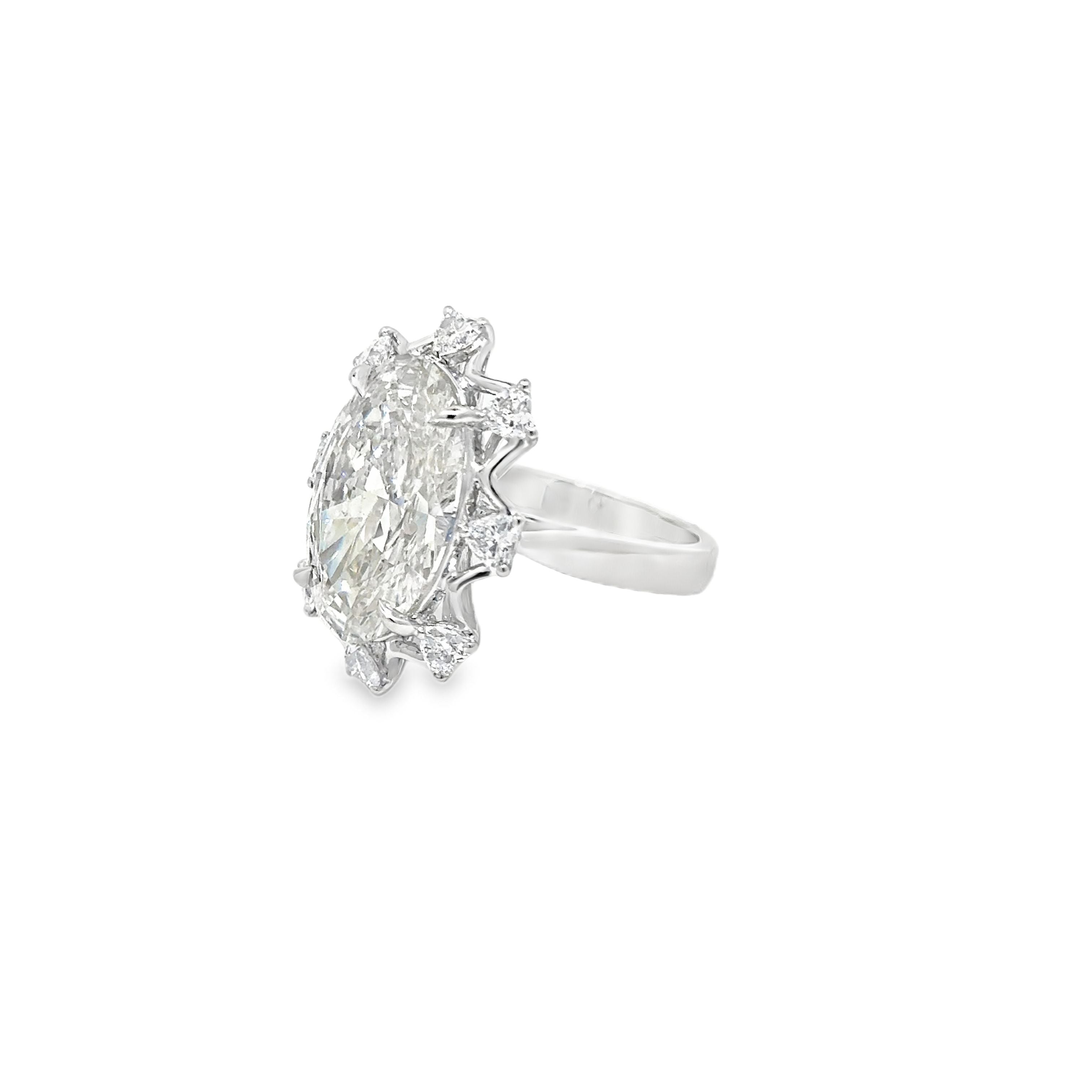 7.14ct Oval Cut Lab Grown Diamond Surrounded By Heart Shape Diamonds Set In Platinum