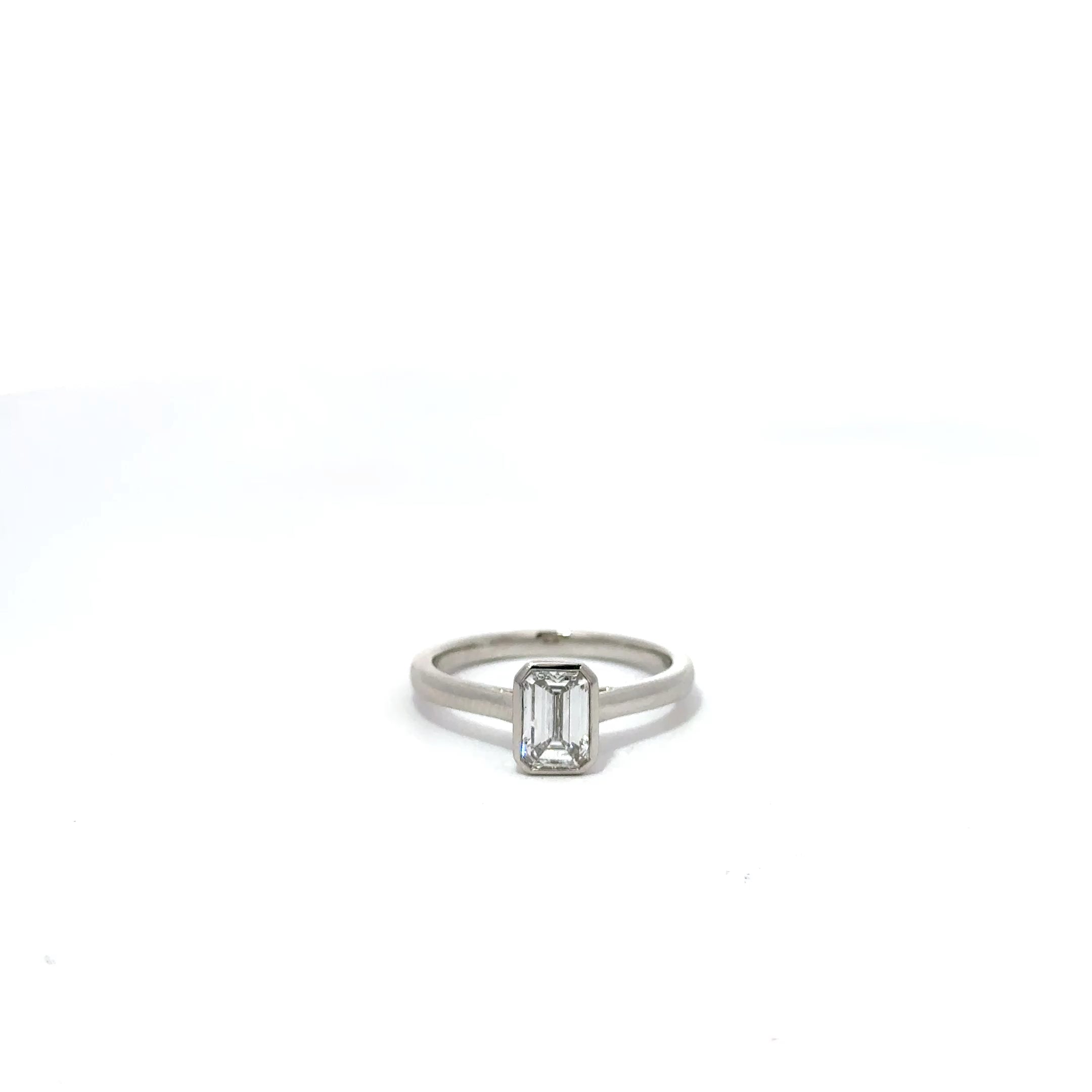 1.01ct Emerald Cut Lab Grown Diamond Bezel Set In Platinum