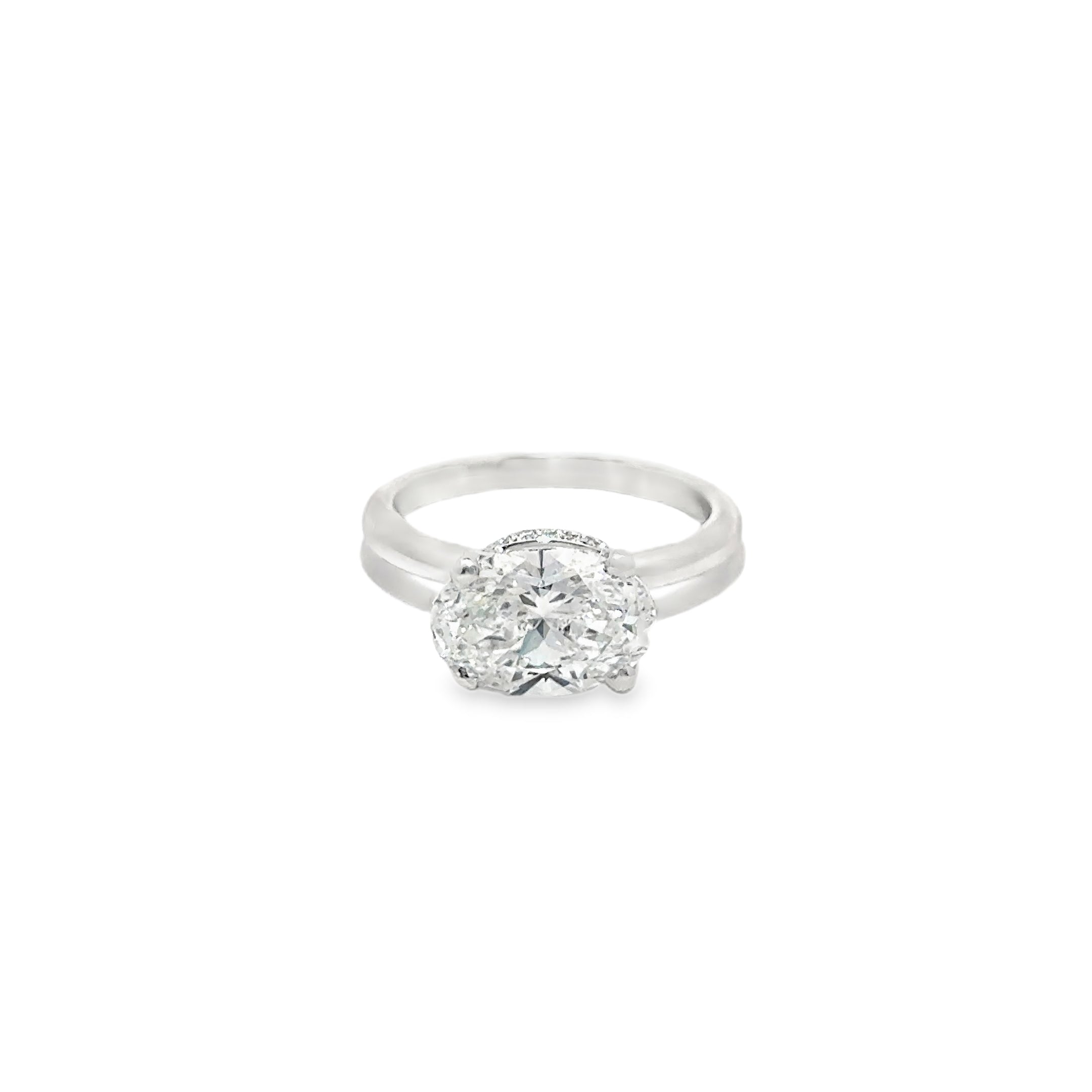 2.60ct Oval Brilliant Cut Lab Grown Diamond With a Hidden Halo Set in Platinum