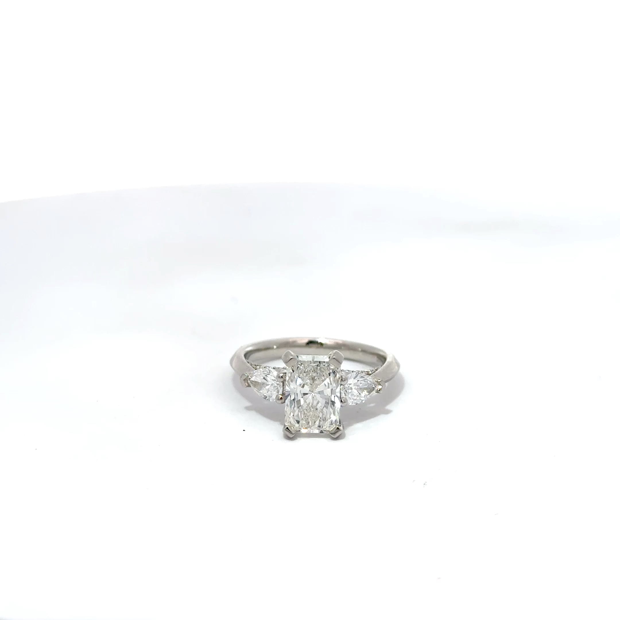 2.82ct Radiant Cut Lab Grown Diamond 3 Stone Ring Set In Platinum