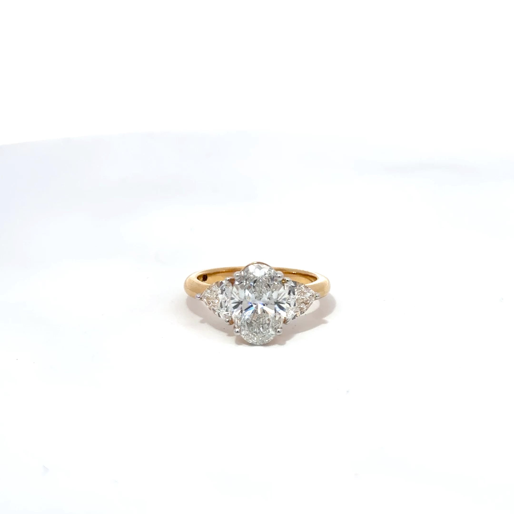 3.56ct Oval Cut Lab Grown Diamond 3 Stone Ring Set In 18ct Yellow Gold