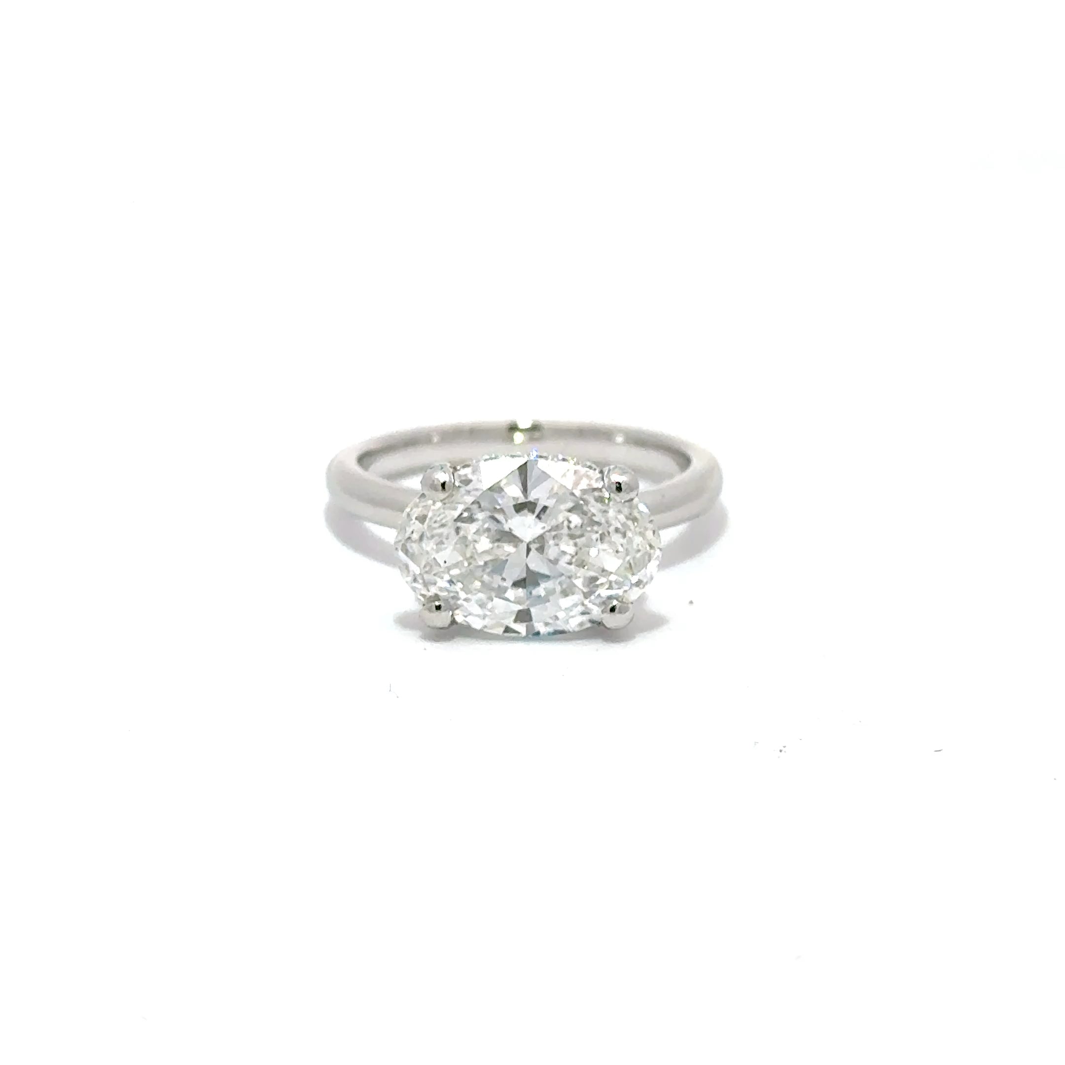 3.53ct Oval Cut Lab Grown Diamond Ring With A Diamond Hidden Halo Set In Platinum 950