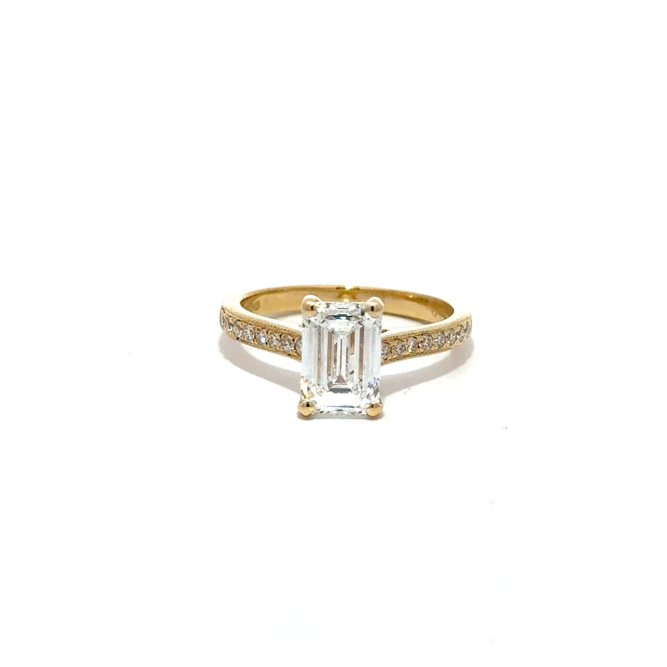 2.08ct Emerald Cut Lab Grown Diamond Ring With Diamond Set Shoulders Set In 18ct Yellow Gold