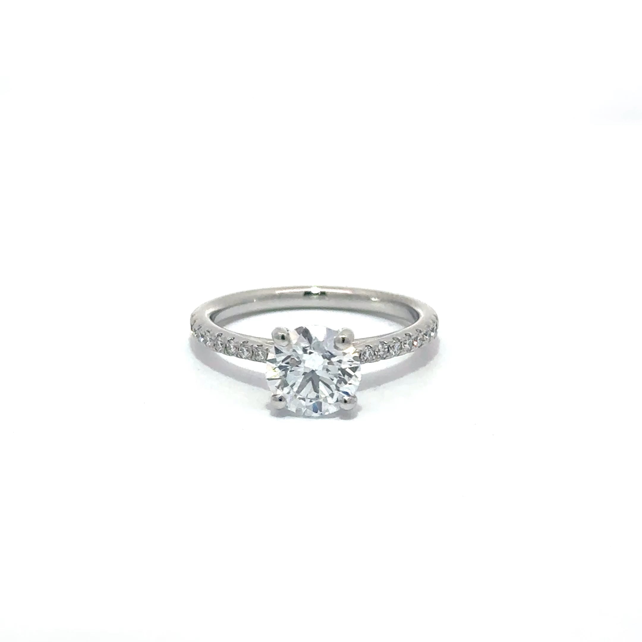 1.52ct Round Brilliant Cut Lab Grown Diamond Ring Set in 18ct White Gold With Diamond Set Shoulders