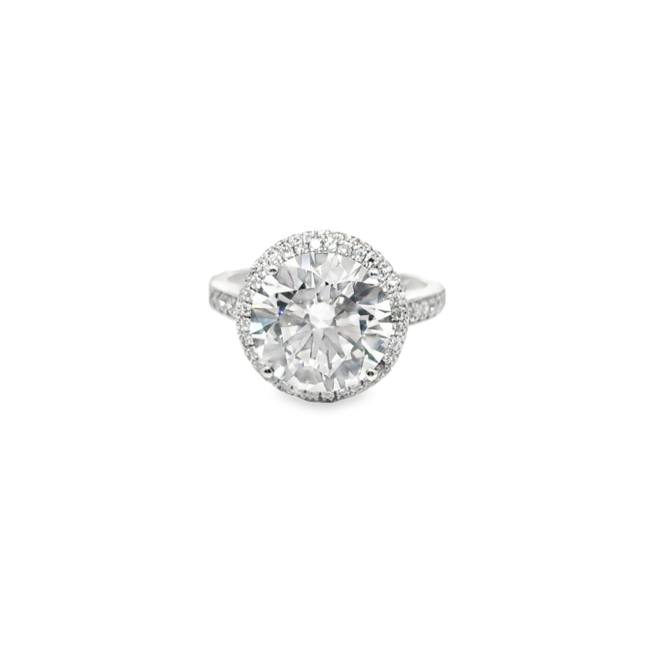 5.73ct Round Brilliant Cut Lab Grown Diamond With A Diamond Halo Set in Platinum