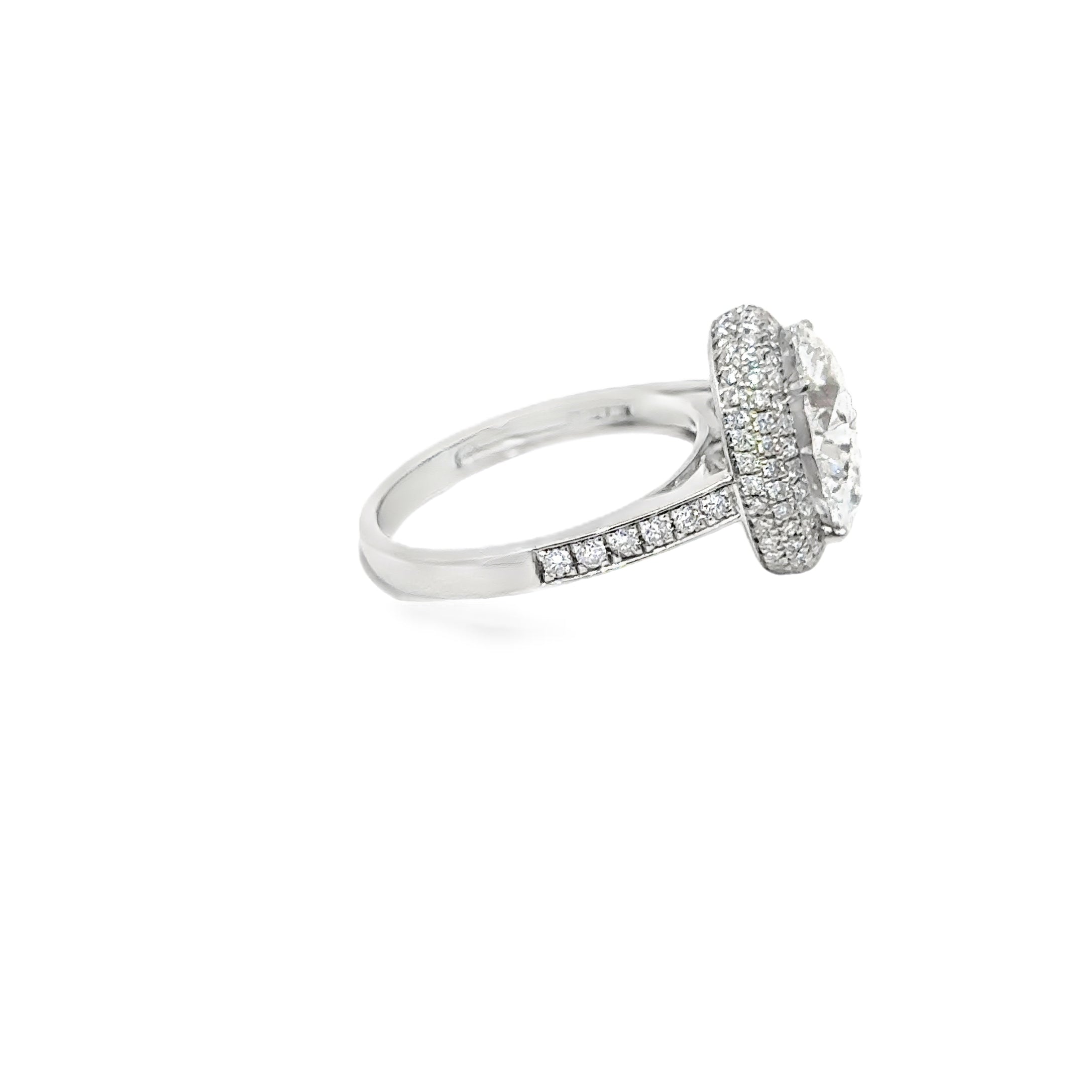 5.73ct Round Brilliant Cut Lab Grown Diamond With A Diamond Halo Set in Platinum