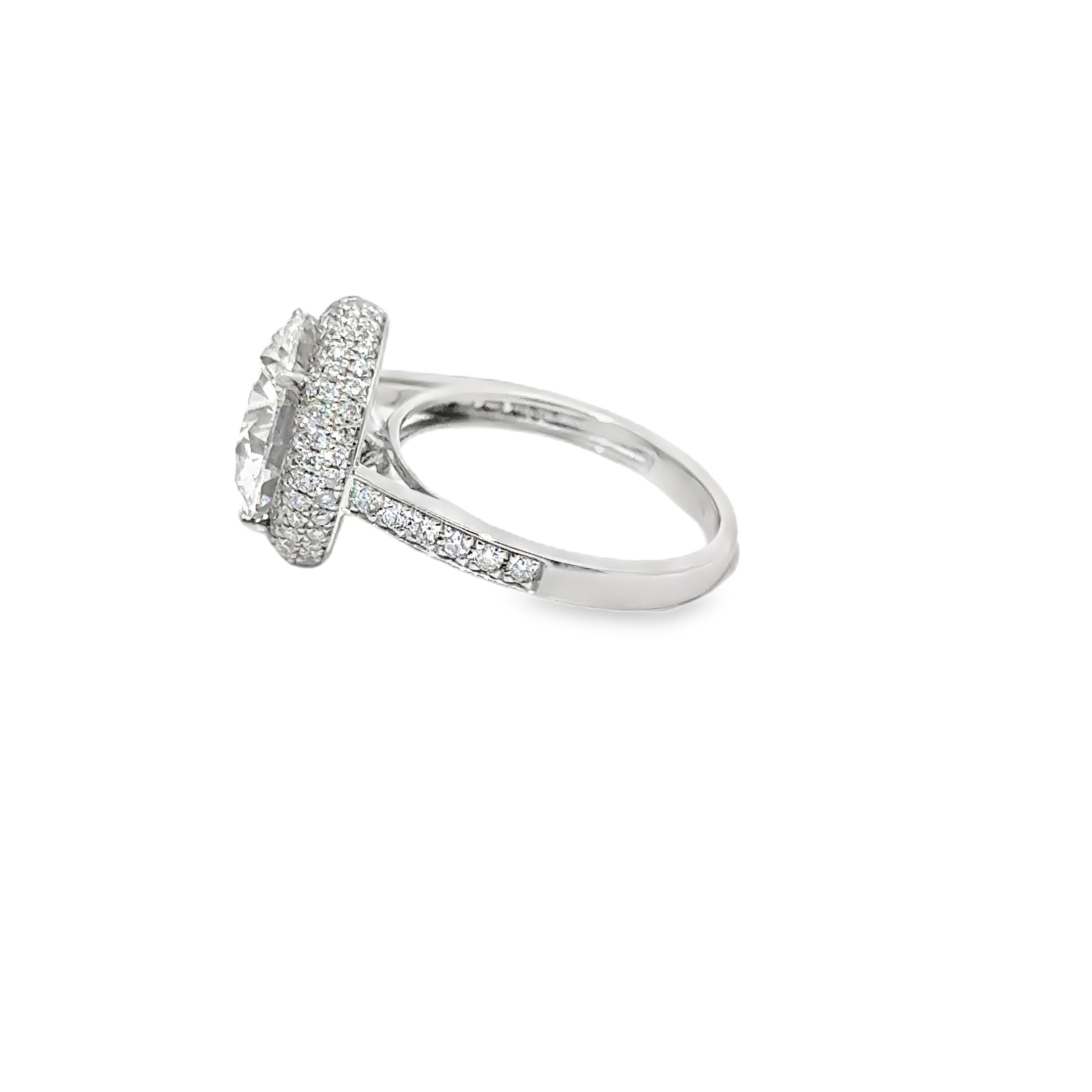 5.73ct Round Brilliant Cut Lab Grown Diamond With A Diamond Halo Set in Platinum