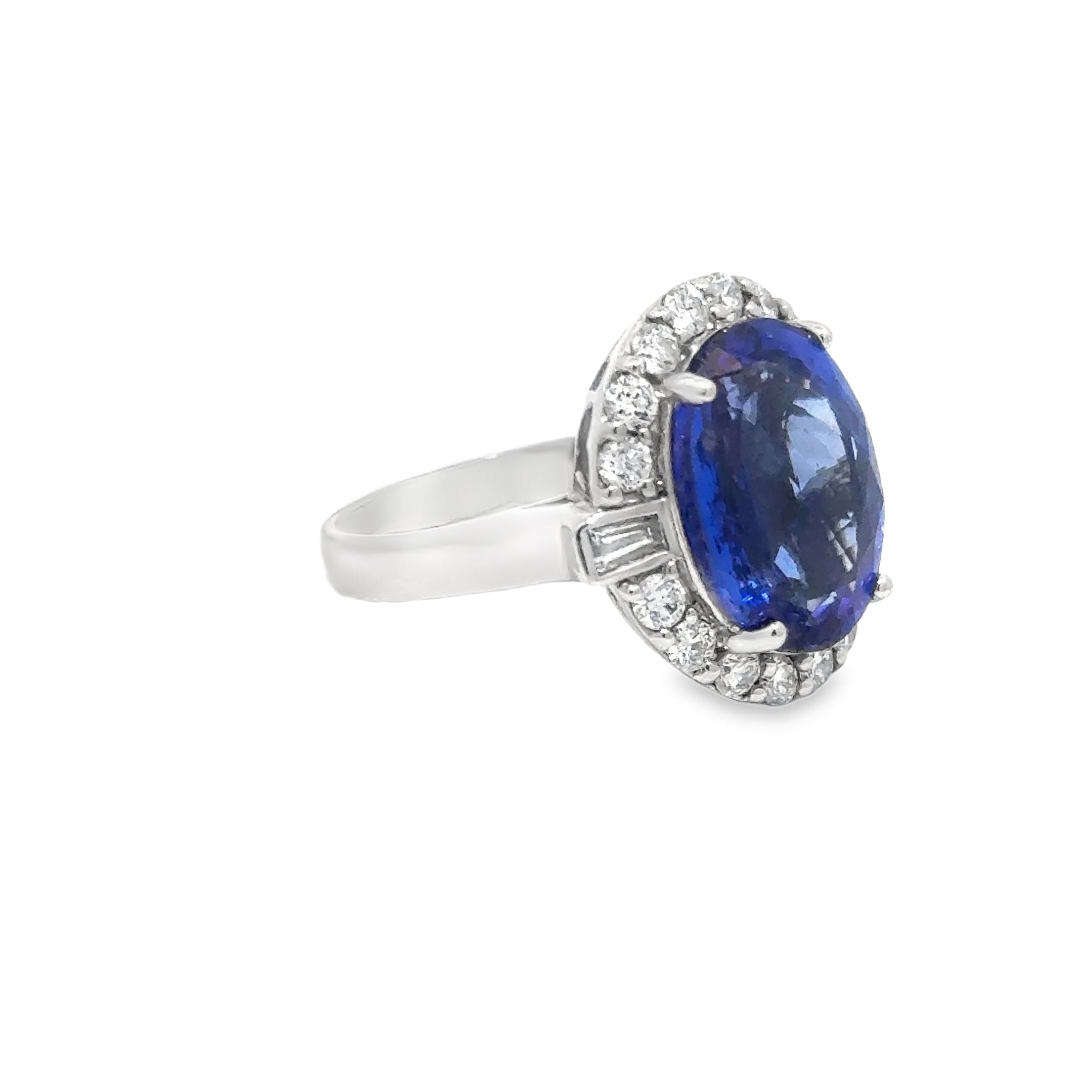 7.35ct Tanzanite And Diamond Halo Ring Set in 18ct White Gold