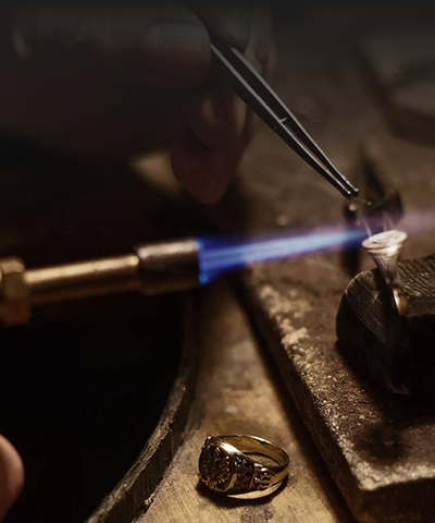 Soldering a ring at the Hamlington's workbench