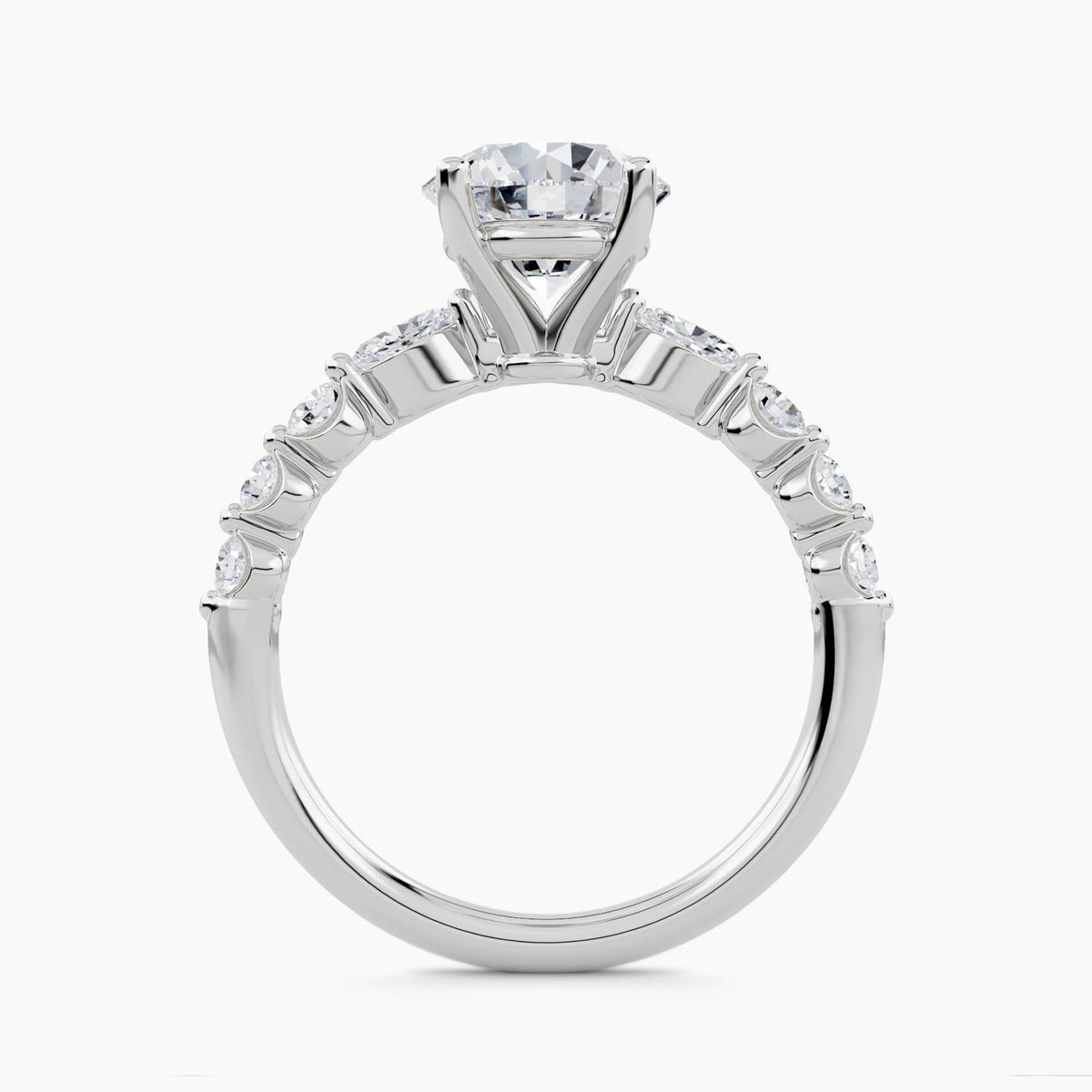 Solitaire With Pear & Round Side Stones, front view